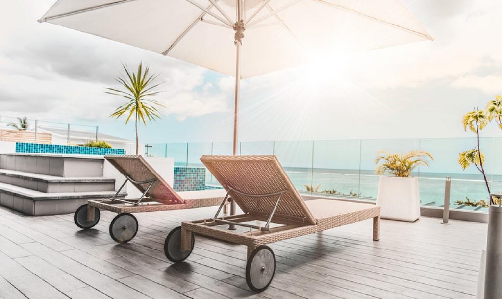 Appartamento Cap Ouest Luxury Penthouse By Dream Escapes Flic-en-Flacq Esterno foto